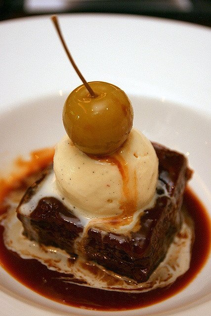 Steamed Toffee and Date Pudding with toffee sauce and vanilla ice cream