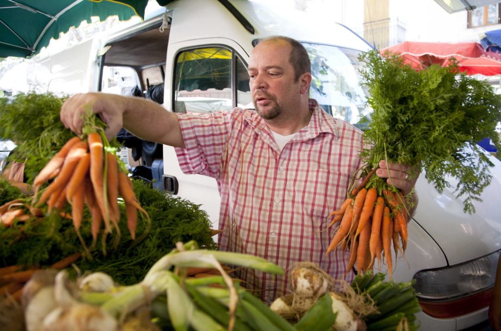 Three Michelin-star chef Gilles Goujon in the market